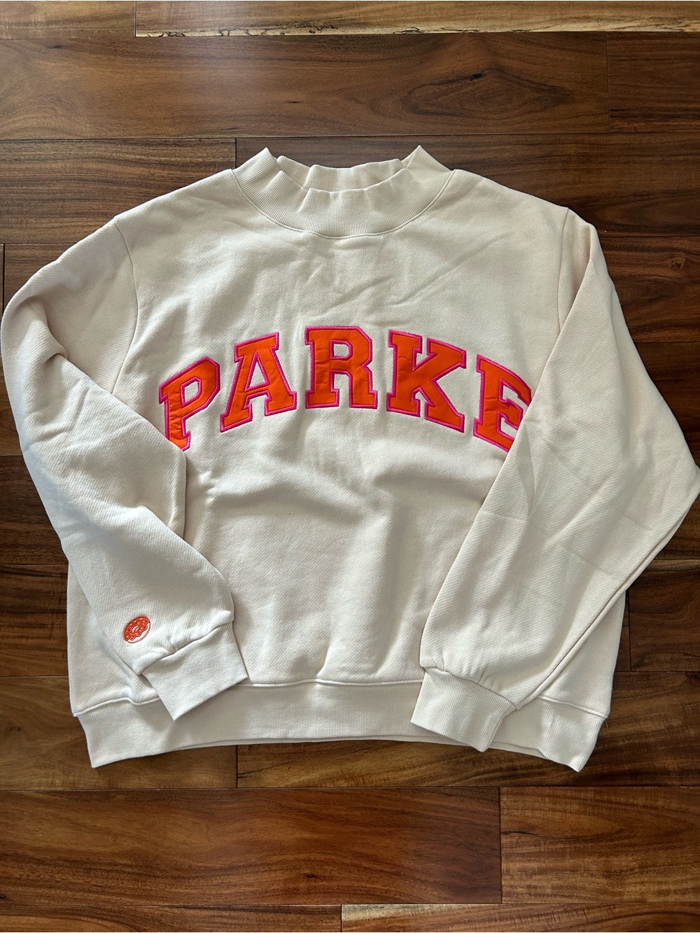 Parker Cream Crewneck with Neon Orange & Pink Logo